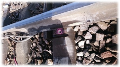 Restored hole in a railway sleeper